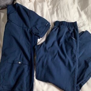 Navy blue scrubs (top and bottom)